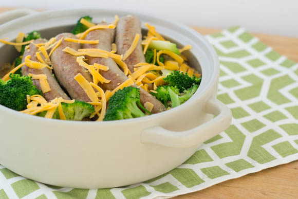 Sausage, broccoli, quinoa and cheese in a pot.