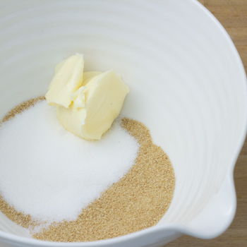 maple sugar, margarine, and granulated sugar in a bowl