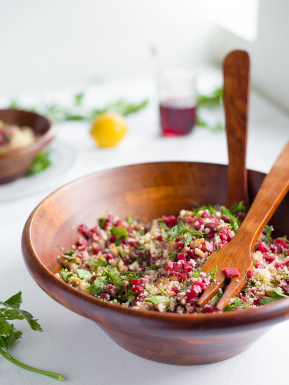 couscous salad mixed in a bowl.