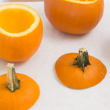 Pumpkins cut open with insides removed.