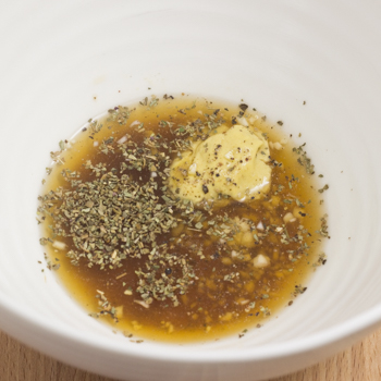 Thyme, salt, and margarine combined in a bowl.