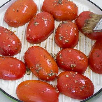 brushing backs of tomatoes